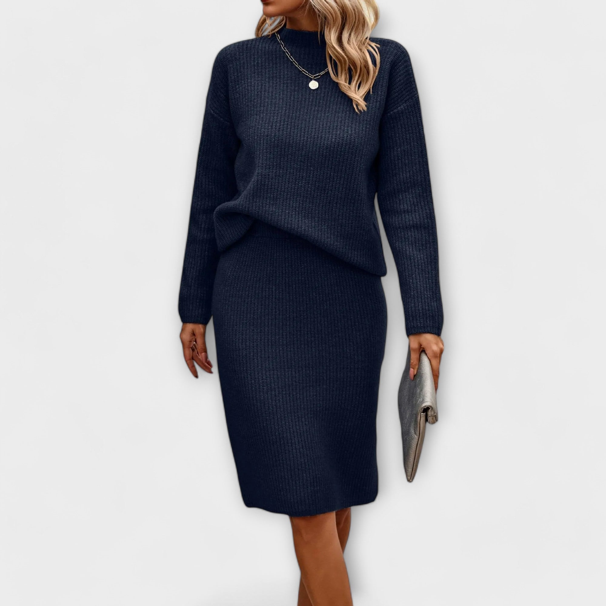 Complete with sweater and two-piece skirt